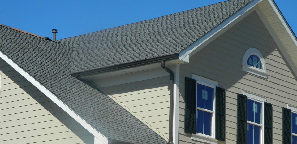 Installed architectural shingles and hardie siding