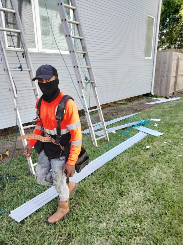 At job site installing Vinyl siding in Up town New Orleans